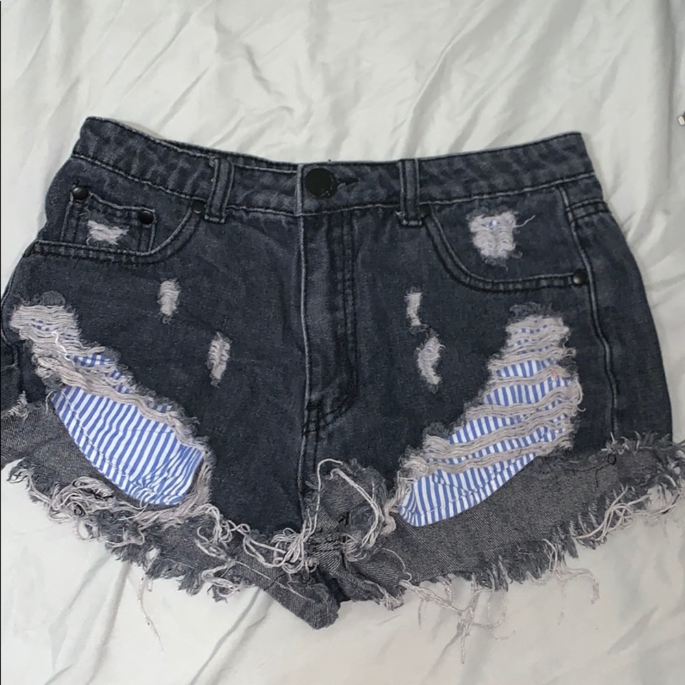 Distressed faded black denim shorts